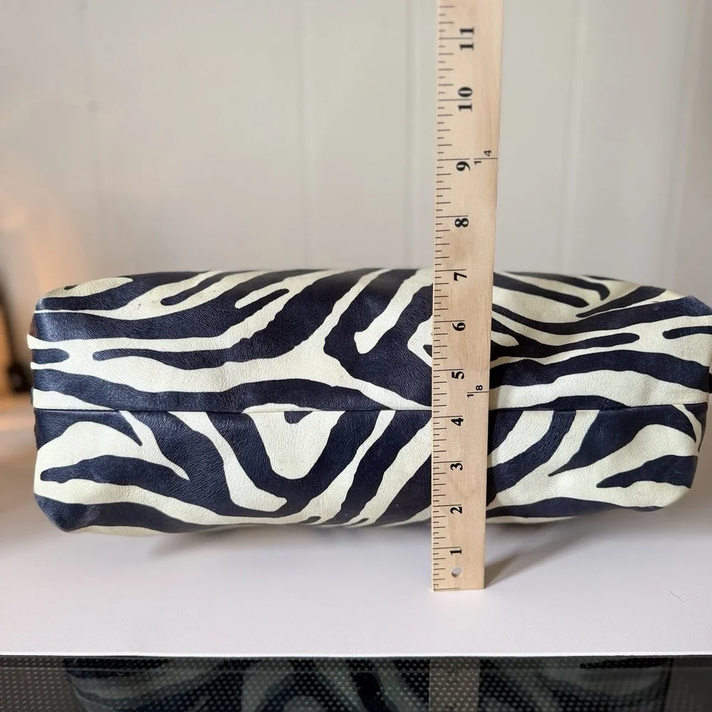 Dooney & Bourke Black and Cream Zebra Print Hobo with Red Trim